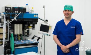 Dr Alejandro Gutierrez in operating room with bariatric equipment